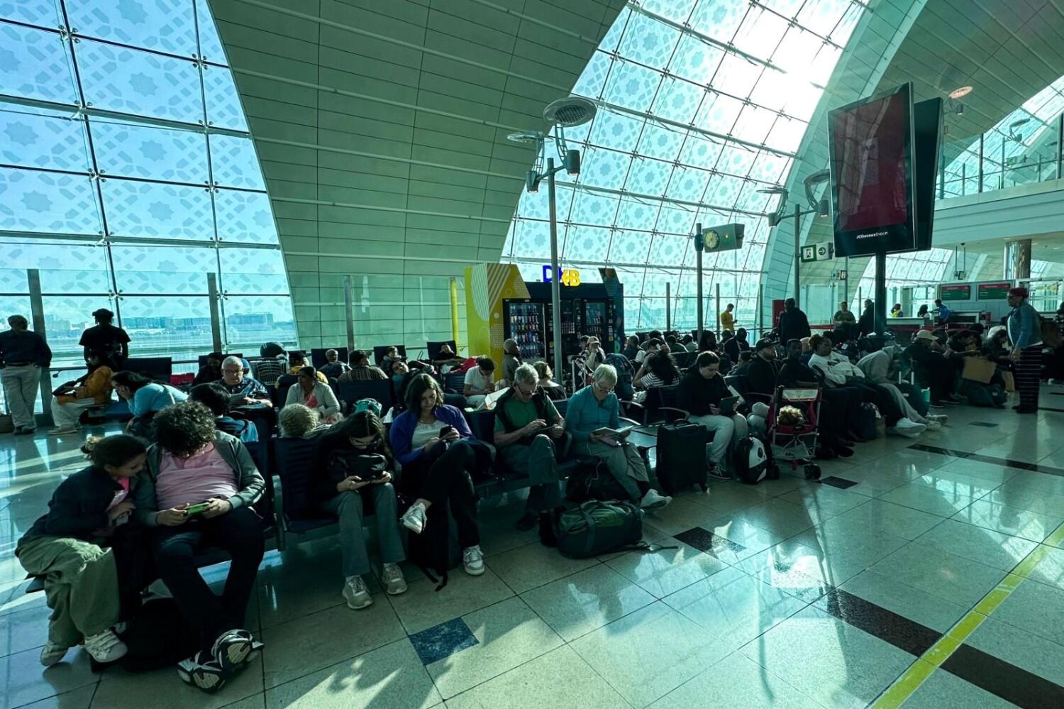 Passengers waiting for their flights at the Dubai International Airport on April 17, 2024. Photo: AFP